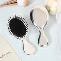 Portable mini air cushion hairbrush with sleek silver chrome finish for massage - Electroplated Silver (Black Cushion)