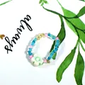 Colorful seed bead ring featuring a white flower charm in dopamine style. - Sky Blue Pink Yellow Mix with White Flower (Style 31)