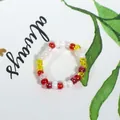 Handmade bohemian style multi-color rice bead ring featuring red white and yellow accents - Red White Yellow Mix (Style 38)