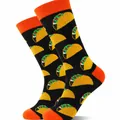 Close-up of vibrant cartoon taco pattern on black crew socks with orange cuffs - Taco Style / Black