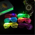 Detailed view of six colorful LED shutter glasses glowing brightly in a dark setting - 3-LED Shutter Glasses