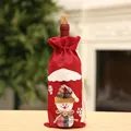 Detailed view of red burlap Christmas wine bottle cover featuring a cute snowman design - Red Snowman Style