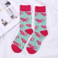 Casual crew socks with vibrant pink flamingo patterns on mint green cotton fabric - One Size / Mint Green With Rose Red