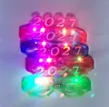 Assorted colorful 2027 glowing LED party glasses for New Year celebration and kids fun - 4-Light 2027 Glasses