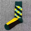 Stylish men's cotton crew socks featuring a colorful argyle diamond pattern design. - One Size / Dark Green Argyle