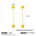 Pendientes largos de estrella dorada mate con diseño minimalista e hipoalergénico. - Pendientes de Borla de Estrella Dorada