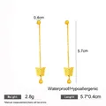 Long matte gold butterfly tassel drop earrings, waterproof and hypoallergenic jewelry - Gold Matte Butterfly Tassel Earrings