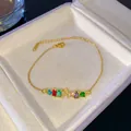 Elegante pulsera con letra A de cristal arcoíris bañada en oro para mujer regalo - Letra A