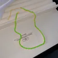 Elegant gold alloy necklace with vibrant green crystal rhinestones for a luxury look - Fluorescent Green