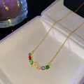 Collier arc-en-ciel de luxe avec un pendentif lettre P en cristal étincelant doré - Style Lettre P