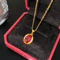 Collier vintage plaqué or avec pendentif ovale en pierre précieuse rouge dans son écrin - Luxe Pierre Rouge Ovale