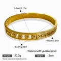 Gouden titanium stalen armband met uitgesneden klavertje vier en Grieks motief maten - Goud Hol Griekse Sleutel Klaver Armring