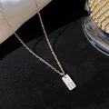 Élégant collier en acier inoxydable argenté orné d'un pendentif lettre H - Lettre H / Argent