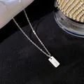Élégant collier en acier titane avec un pendentif rectangulaire lettre J finition or rose - Lettre J / Argent