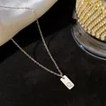 Collier minimaliste en acier titane doré avec pendentif rectangulaire lettre Q - Lettre Q / Argent