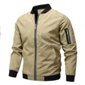 Front view of khaki men's bomber jacket with black ribbed trim and sleeve zipper pocket - M / Tops / Khaki