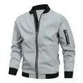 Detailed macro view of a light grey men's bomber jacket with black ribbed cuffs. - 6XL / Tops / Light Gray