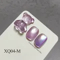 Purple cat eye gel polish set featuring a translucent 3D resin bear nail charm detail. - Purple Style (XQ04-M)