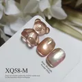 Professional rose gold cat eye nail gel polish effect with a cute 3D bear nail art charm - Rose Gold Cat Eye (XQ58-M)