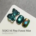 Professional green cat-eye nail gel swatch set with 3D bear charm and aurora finish - Pine Mist (XQ82-M)