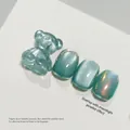 High density teal cat eye nail gel set with 3D bear charm and moonlight powder shimmer - Cyan Cat Eye (XQ83-M)