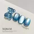 Blue cat-eye gel nail polish set featuring 3D bear charm and moonlight powder effect finish - Blue Cat Eye (XQ84-M)