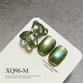 Dark green cat eye gel nail polish with translucent 3D bear decoration, SKU XQ96-M - High Density Glass Bead Cat Eye Style (XQ96-M) / Forest Green Cat Eye