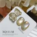 Translucent brown cat eye nail gel set with 3D bear charm and shimmering finish - Amber (XQ111-M)