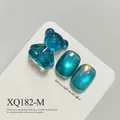 Turquoise cat-eye gel polish effect with cute blue gummy bear nail art charm accessory - Lake Blue Cat Eye (XQ182-M)