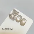 Elegant champagne cat-eye nail art set featuring a cute 3D translucent bear charm decoration - Champagne Cat Eye Style (XQ240-M)