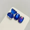 Professional blue cat-eye nail gel featuring bear charm and iridescent moonlight powder finish - Blue Cat Eye (XQ183-M)