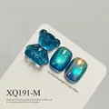 Blue cat eye nail gel polish effect with gummy bear charm and moonlight powder shimmer - Sapphire Blue Cat Eye (XQ191-M)