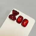 Premium dark red cat-eye effect nail gel charms with a cute 3D resin bear decoration - Deep Red Cat Eye (XQ238-M)