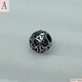 Close-up of vintage stainless steel hollow heart charm bead for DIY jewelry, 9x9.8mm - Heart Hollow Style (A) / 9*9.8mm / Silver (A)