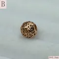 Detailed macro view of a rose gold stainless steel hollow heart bead at 9x9.8mm - Heart Hollow Style (B) / 9*9.8mm / Rose Gold (Style B)
