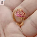 Macro detail of a vintage style heart-shaped open ring with micro-set pink zircon stones - Style B (Rose Red Heart)