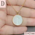 Detalle del colgante de San Benito en oro con incrustación de nácar, talla 21x21mm. - San Benito Estilo D / 21mmx21mm