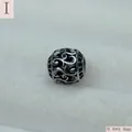 Close-up of retro hollow stainless steel round bead, 9.8x9.8mm, for DIY jewelry making. - Antique Silver (Style I)