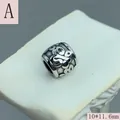 Macro view of vintage stainless steel large-hole charm bead for jewelry making. - Relief 3D Pattern (A) / 10x11.6mm
