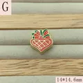 Detail of Christmas themed red and green enamel charm bead measuring 14x14.6mm - Christmas Gift Box (G)