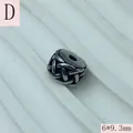 Detailed view of a stainless steel woven spacer bead for DIY jewelry crafting. - Woven Texture (D) / 6x9.3mm