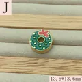 Close-up of a green enamel Christmas wreath charm with a red bow for DIY jewelry making - Christmas Wreath (J)