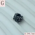 Close-up of stainless steel star pattern bead measuring 6.3x8.5mm for jewelry making. - 6.3x8.5mm