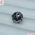 Detailaufnahme einer Vintage-Abstandsperle aus Titanstahl mit Sechseckstern-Design - Hexagon Star Hollow (Style C) / 9.7*8.6mm / Antik Silber
