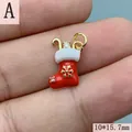 Detailed close-up of a red enamel Christmas stocking charm with gold snowflake - Christmas Sock Style A (182) / 10*15.7mm / Gold