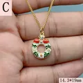 Macro view of gold Christmas wreath pendant necklace with colorful zircons and enamel - Christmas Wreath Style (C) / Gold