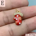 Detailed view of red enamel Christmas mitten pendant with sparkling CZ stones and size mark - 11.8*19mm