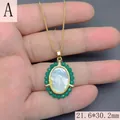Detail view of Our Lady of Guadalupe pendant with mother of pearl inlay and green beads - Green Agate Style (A)