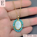Macro detail of Guadalupe Virgin Mary necklace with white shell and turquoise beads - Turquoise Color Style (E)