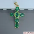 Detailed view of a gold-plated green zircon cross pendant with 19.2x30mm dimensions - 19.2x30mm / Green